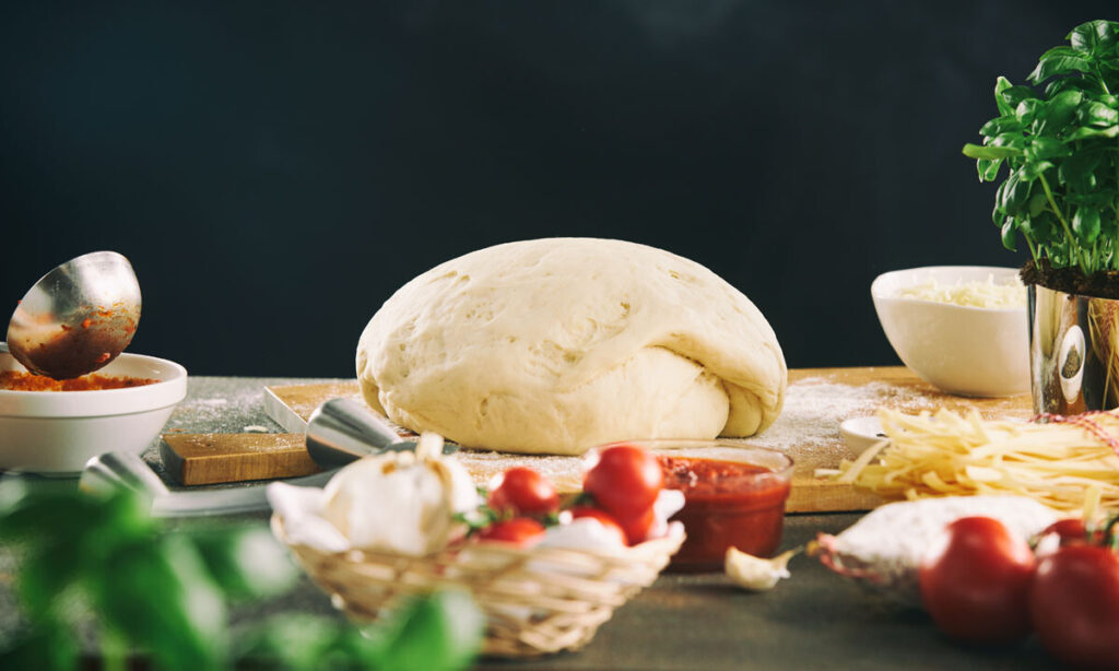 Mound of dough on cutting board