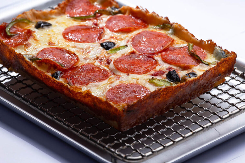 Detroit style pan pizza, never hand-tossed