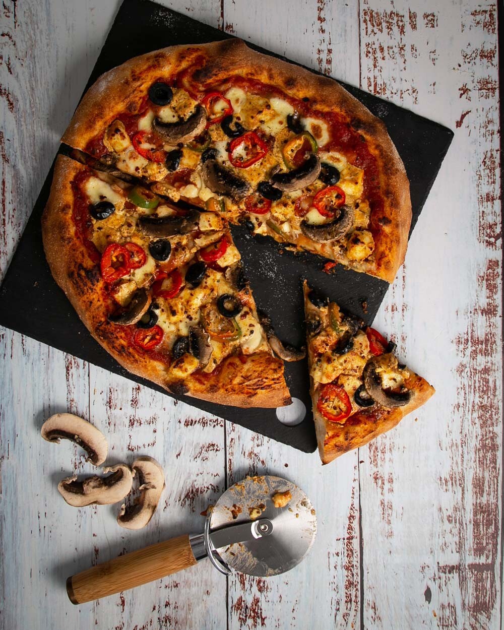 Number 1 of the best pizza recipes; Paneer pizza on a white background.