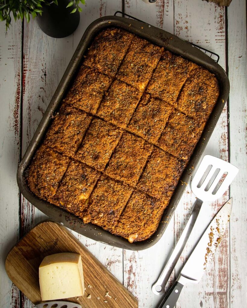 Sfincione (Sicilian New Years Pizza with Bread Crumbs, Onions, and