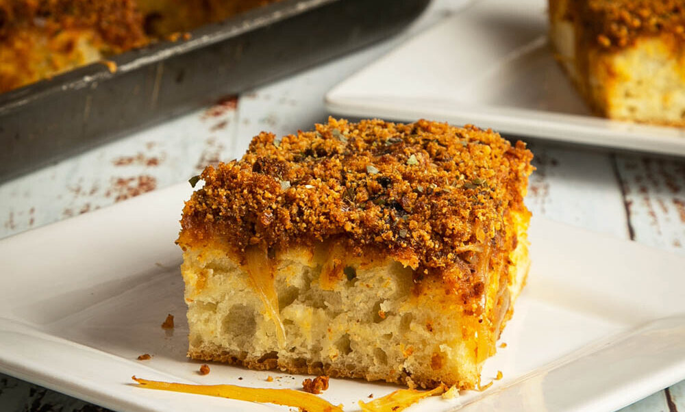 Sfincione (Sicilian New Years Pizza with Bread Crumbs, Onions, and