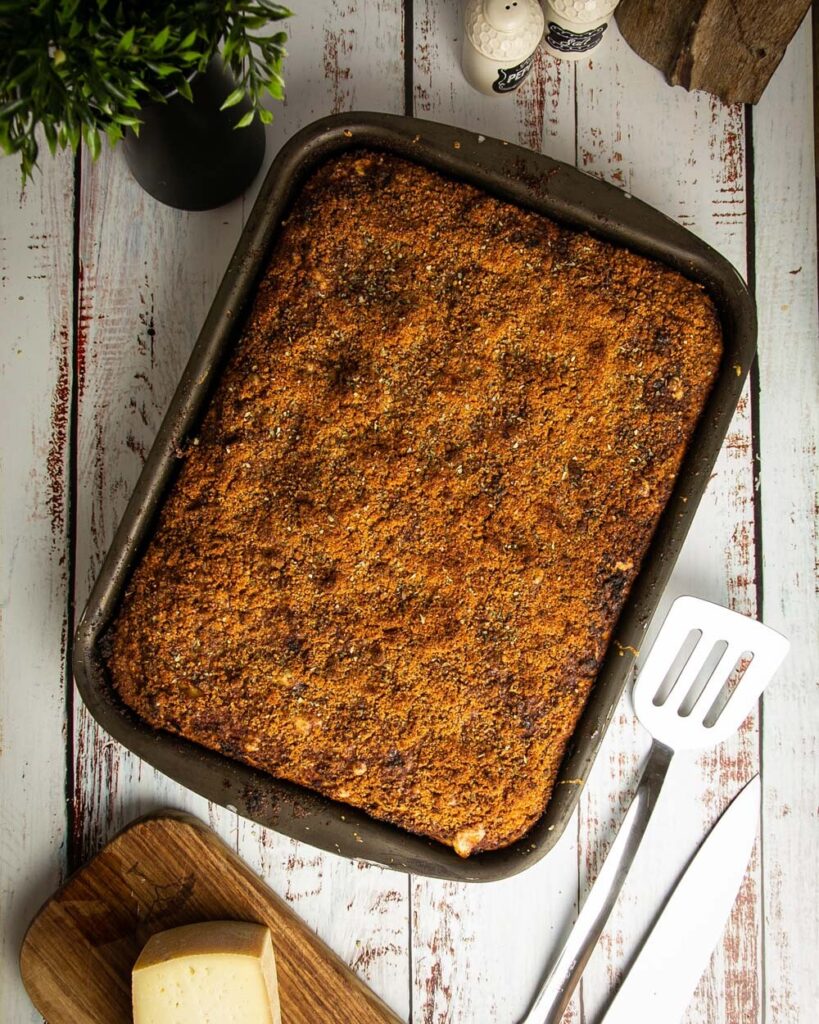 Sfincione (Sicilian New Years Pizza with Bread Crumbs, Onions, and