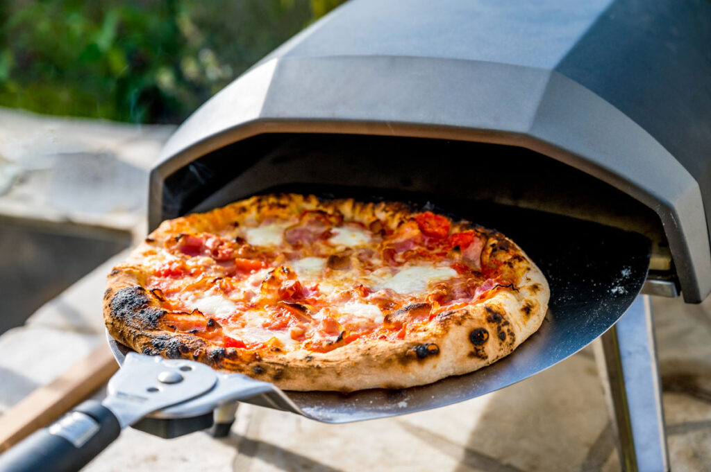 Ultimate crispy pizza crust is achieved with a pizza oven.